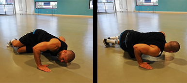 Homem a fazer uma push-up corkscrew | Holmes Place