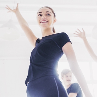 woman laugh indoor workout sunny class | Holmes Place