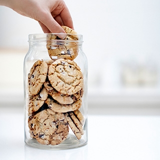 Holmes Place | hand in cookie jar