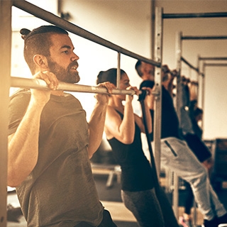 Men Doing Pull-ups | Holmes Place